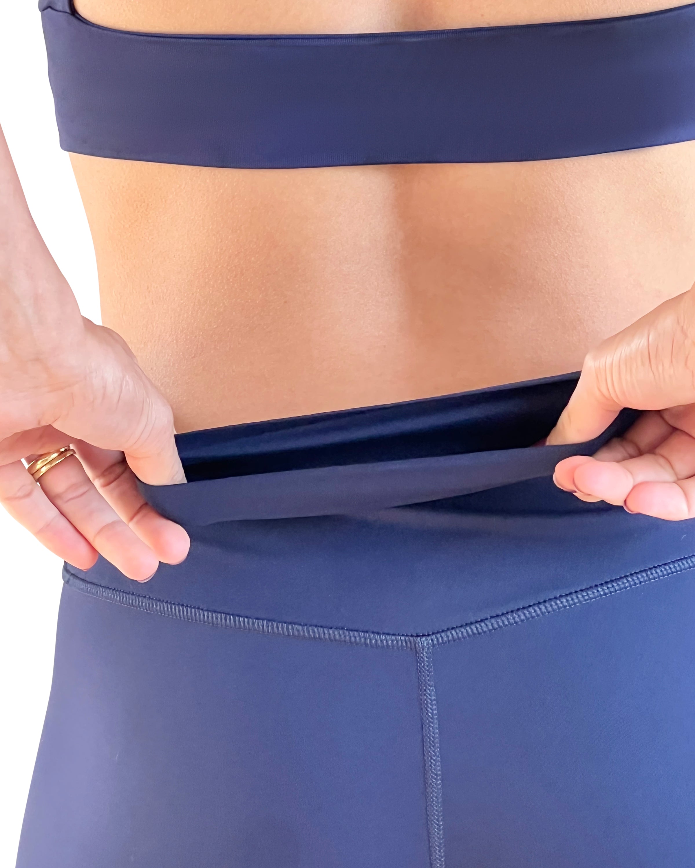 Navy Blue Leggings with a high-rise waistband, no front seam, and a sculpting second-skin fit for gym workout, Pilates, yoga or everyday use.