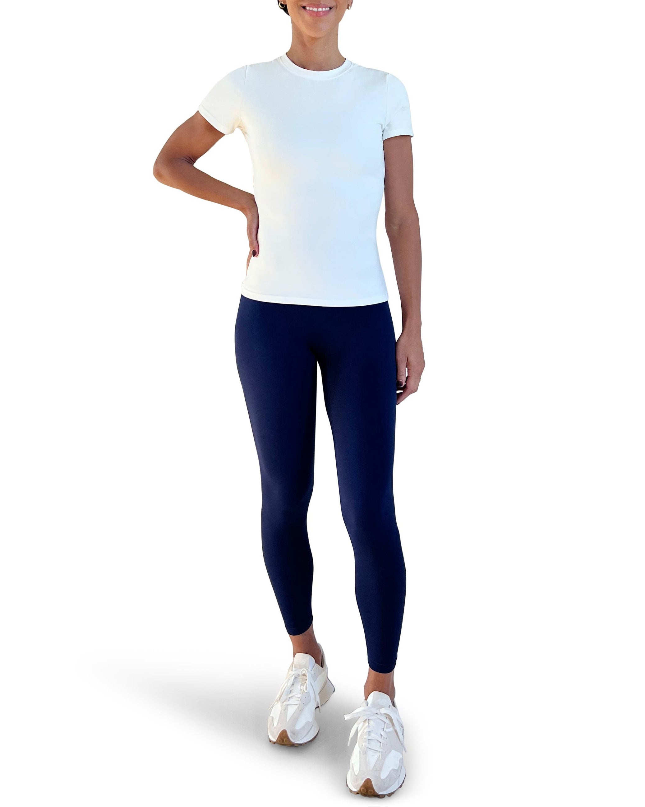 Navy Blue Leggings with a high-rise waistband, no front seam, and a sculpting second-skin fit for gym workout, Pilates, yoga or everyday use.