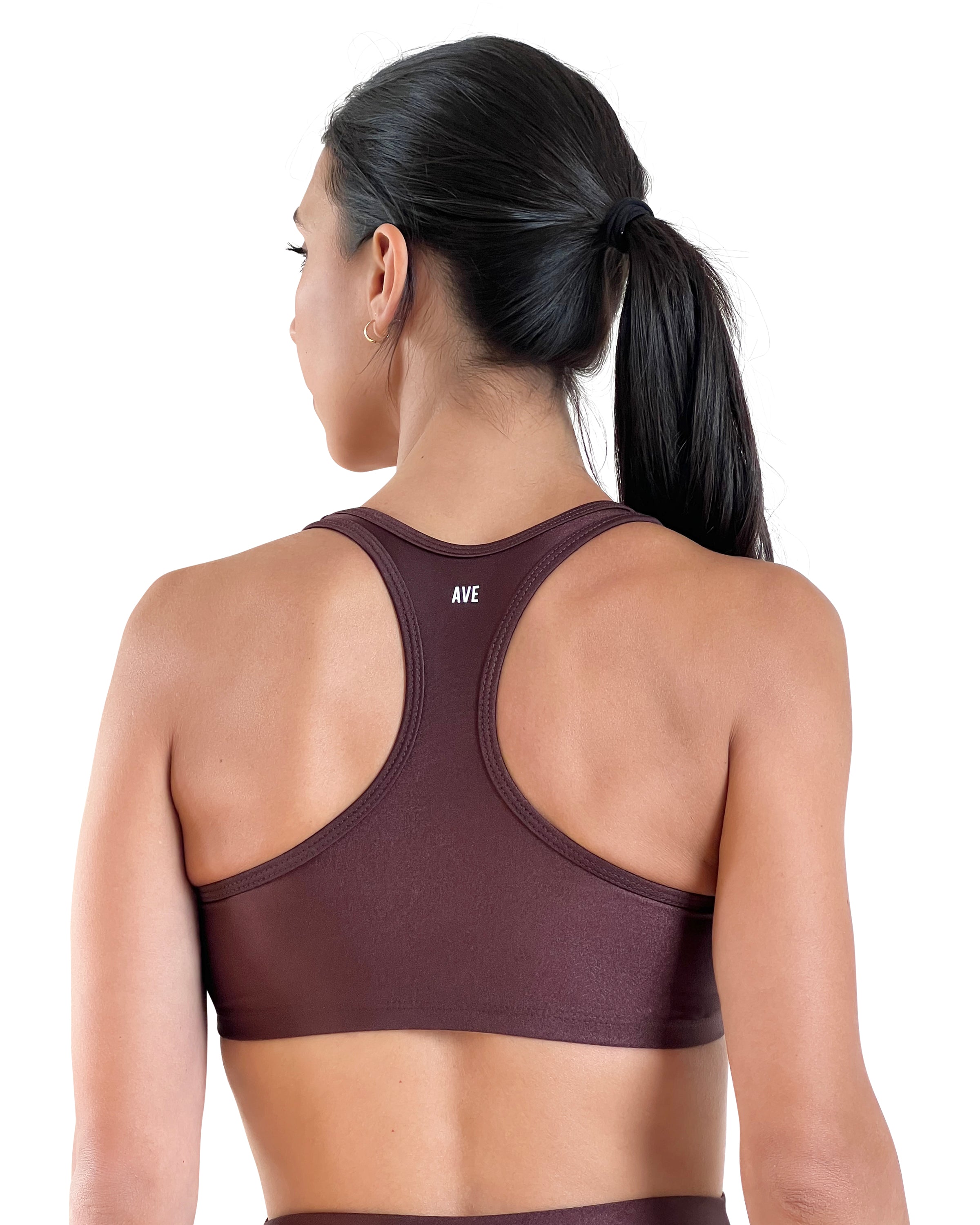 Women's brown racerback sports bra with with AVE branding and shiny performance fabric, medium support, and comfortable fit for gym workouts, Pilates, yoga and everyday wear.
