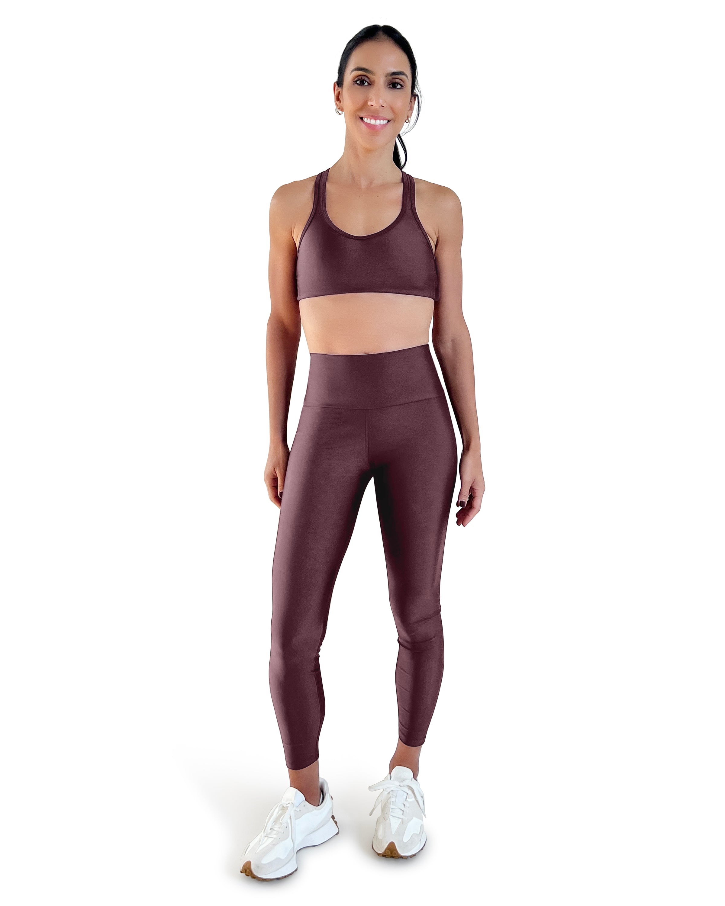 Women's brown racerback sports bra with shiny performance fabric, medium support, and comfortable fit for gym workouts, Pilates, yoga and everyday wear.