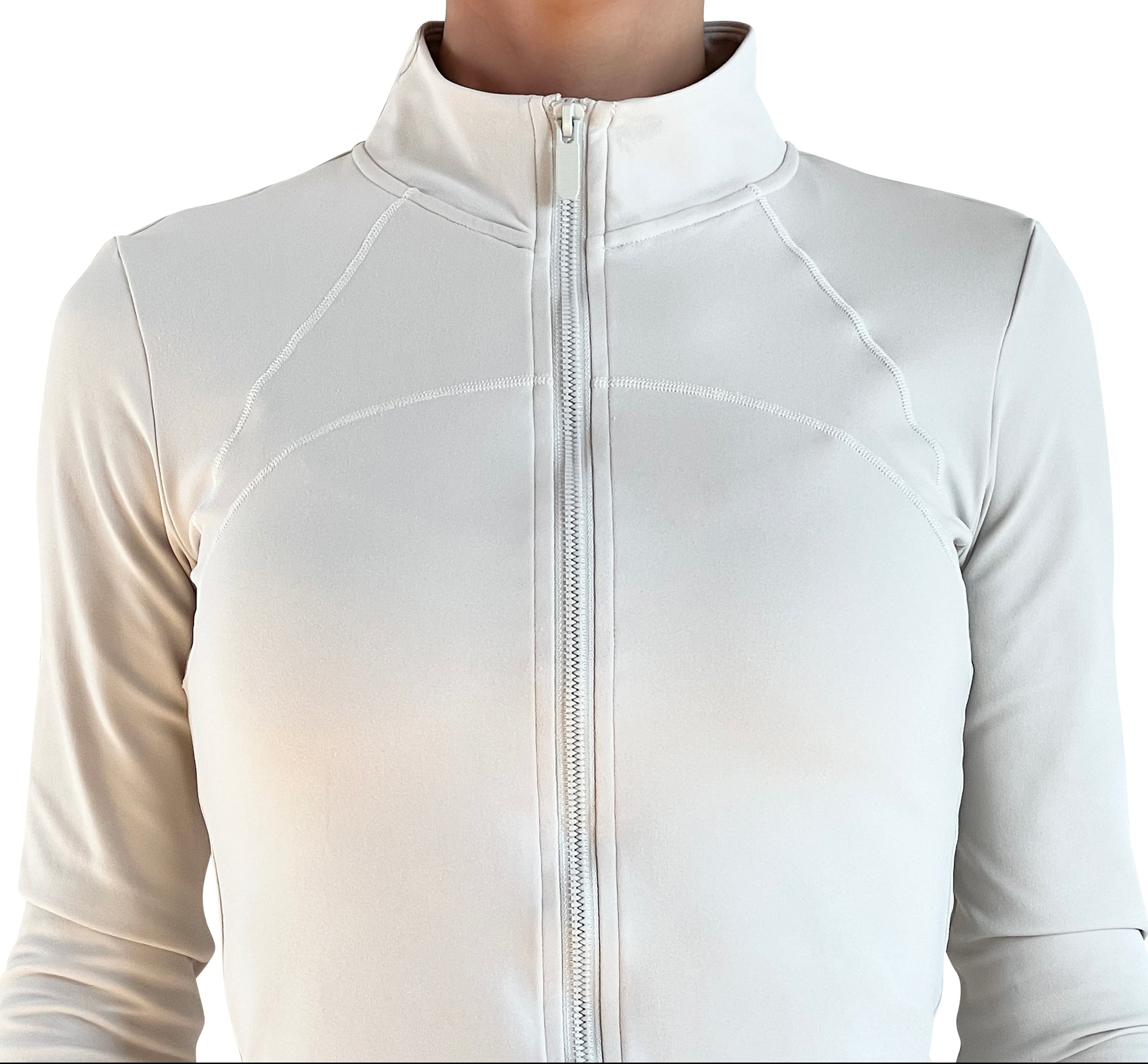 Women's ivory full-zip activewear jacket with thumbholes, four-way stretch fabric, and a flattering fitted silhouette for training, running, travel, and everyday wear.