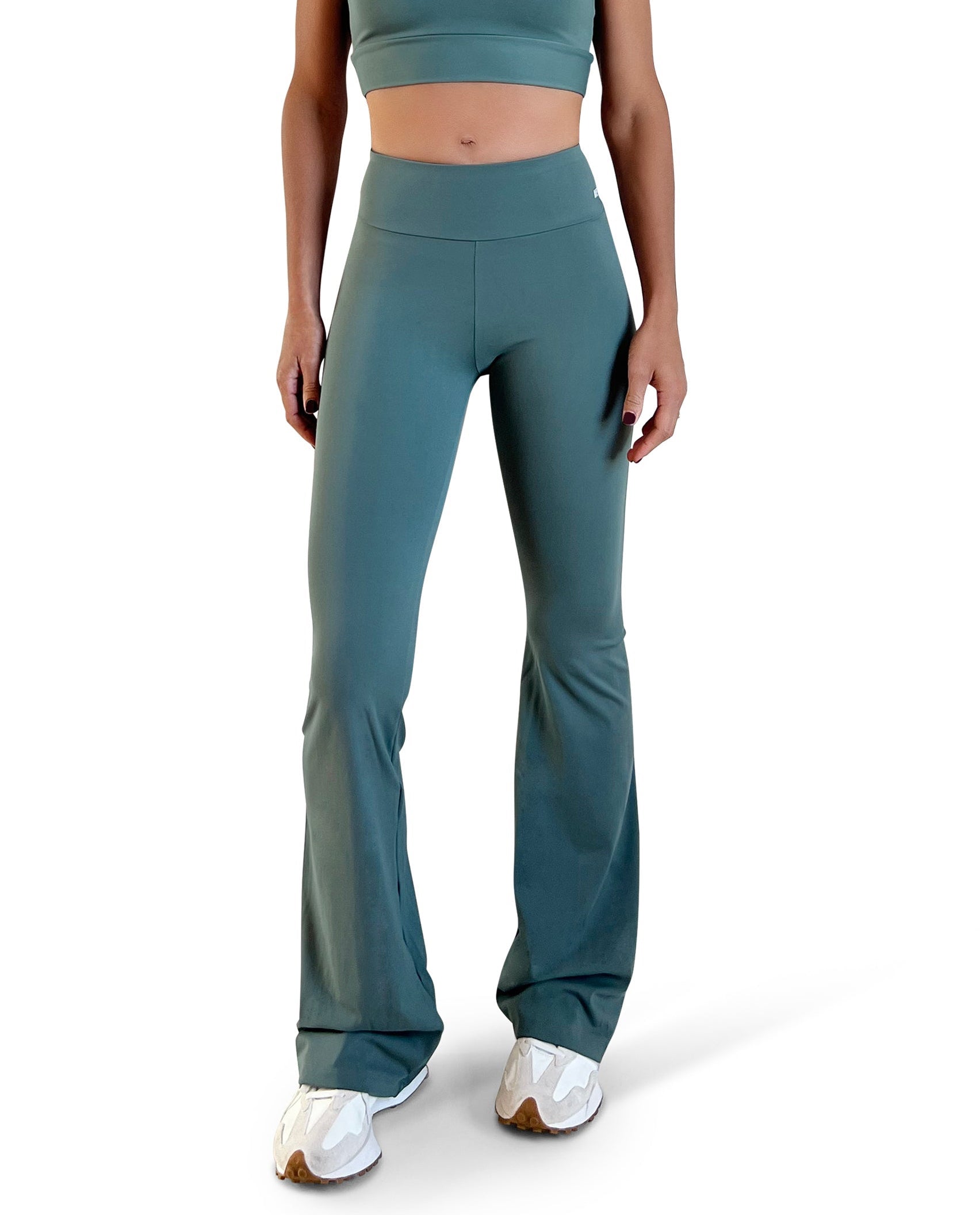 Military green flare leggings featuring a flattering high-rise waistband, elongating silhouette, and buttery-soft performance fabric.